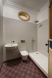 mosaico hidráulico da Projecto Mosaico ref Estrela 2C no piso duma casa de banho projectada pela arquitecta Marta Campos